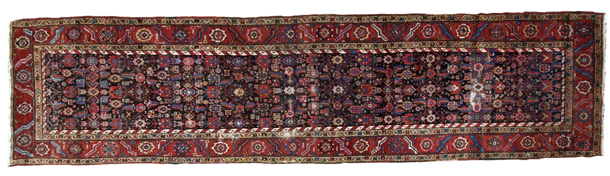 Handmade antique Bakhsaish runner in chocolate brown, red and blue shades. It is from the end of 19th century in good condition.