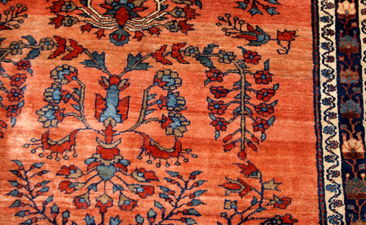 Handmade antique Persian Sarouk rug 1900s