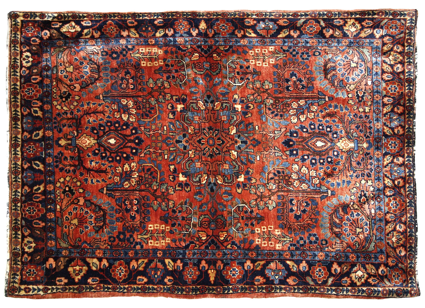 This antique Persian Sarouk rug made in the beginning of 20th century in red wool. The rug is in original good condition.