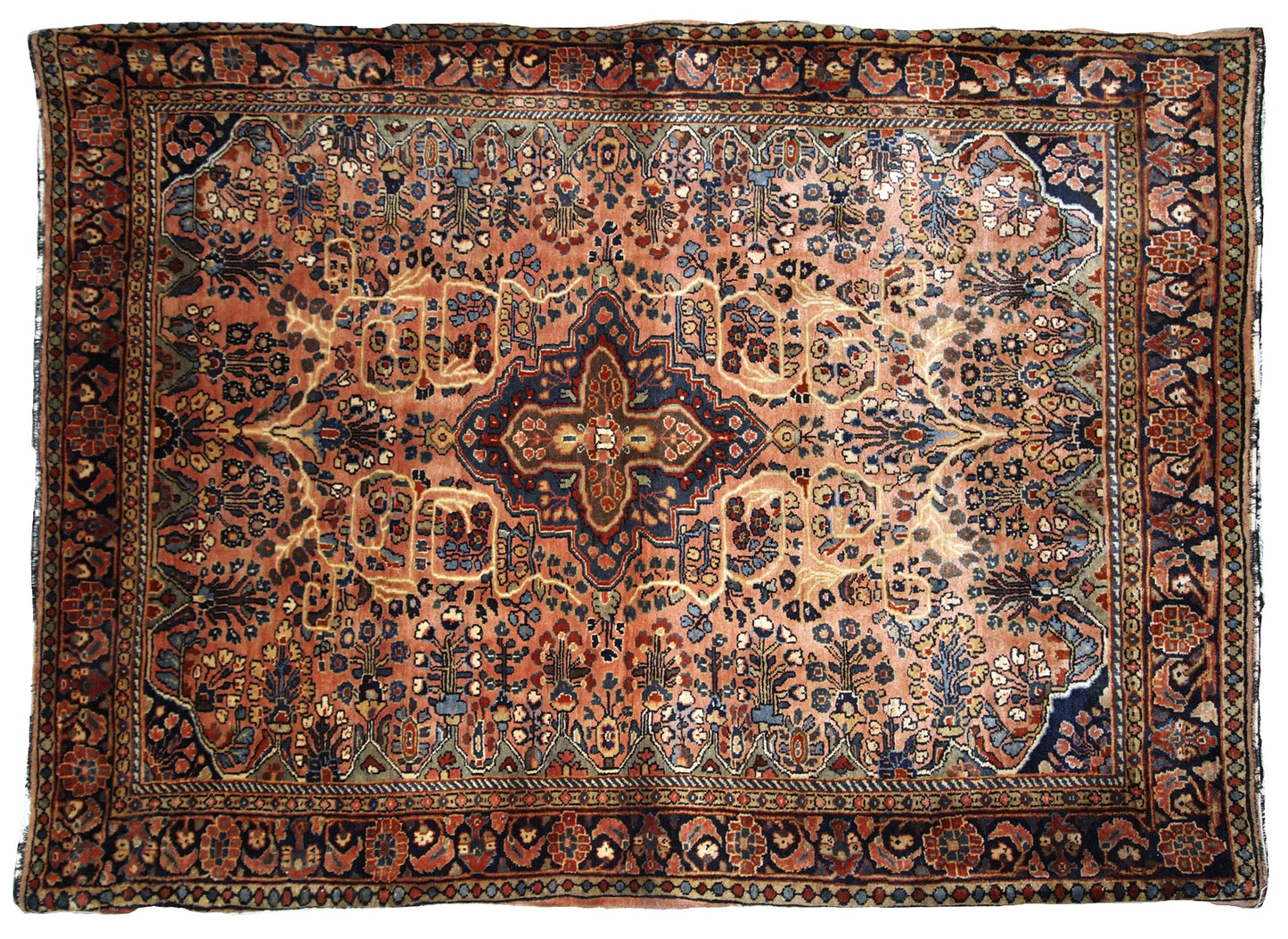Antique hand made Persian Sarouk rug in peach shades. The rug is from the beginning of 20th century in original good condition.