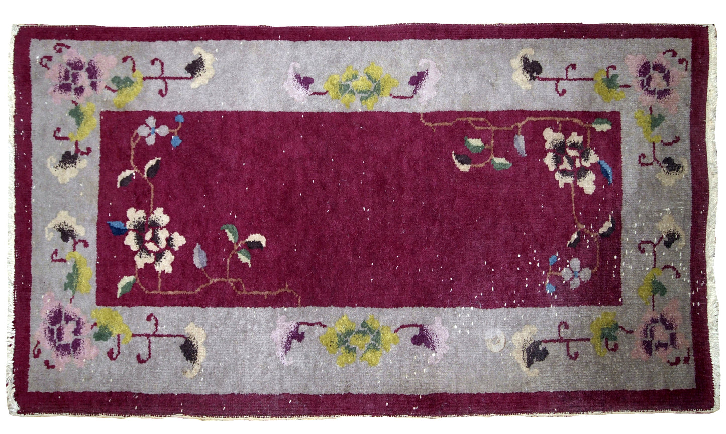 Antique Art Deco Chinese rug in Bordeaux and silver shades. The rug is from 1920s in original good condition.