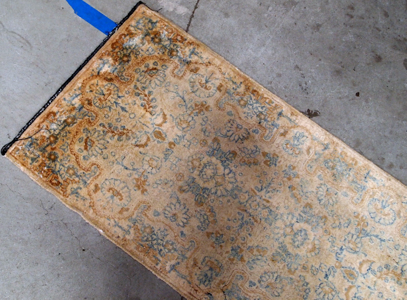 Hand made antique Persian Kerman rug in beige and sky blue shades. The rug is from the beginning of 20th century in original good condition.