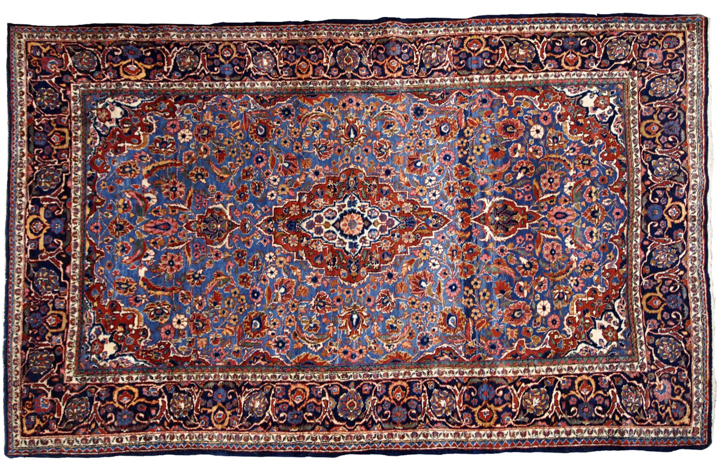 Antique Persian hand made Kashan rug in sky blue color. The rug is in original good condition from the beginning of 20th century.