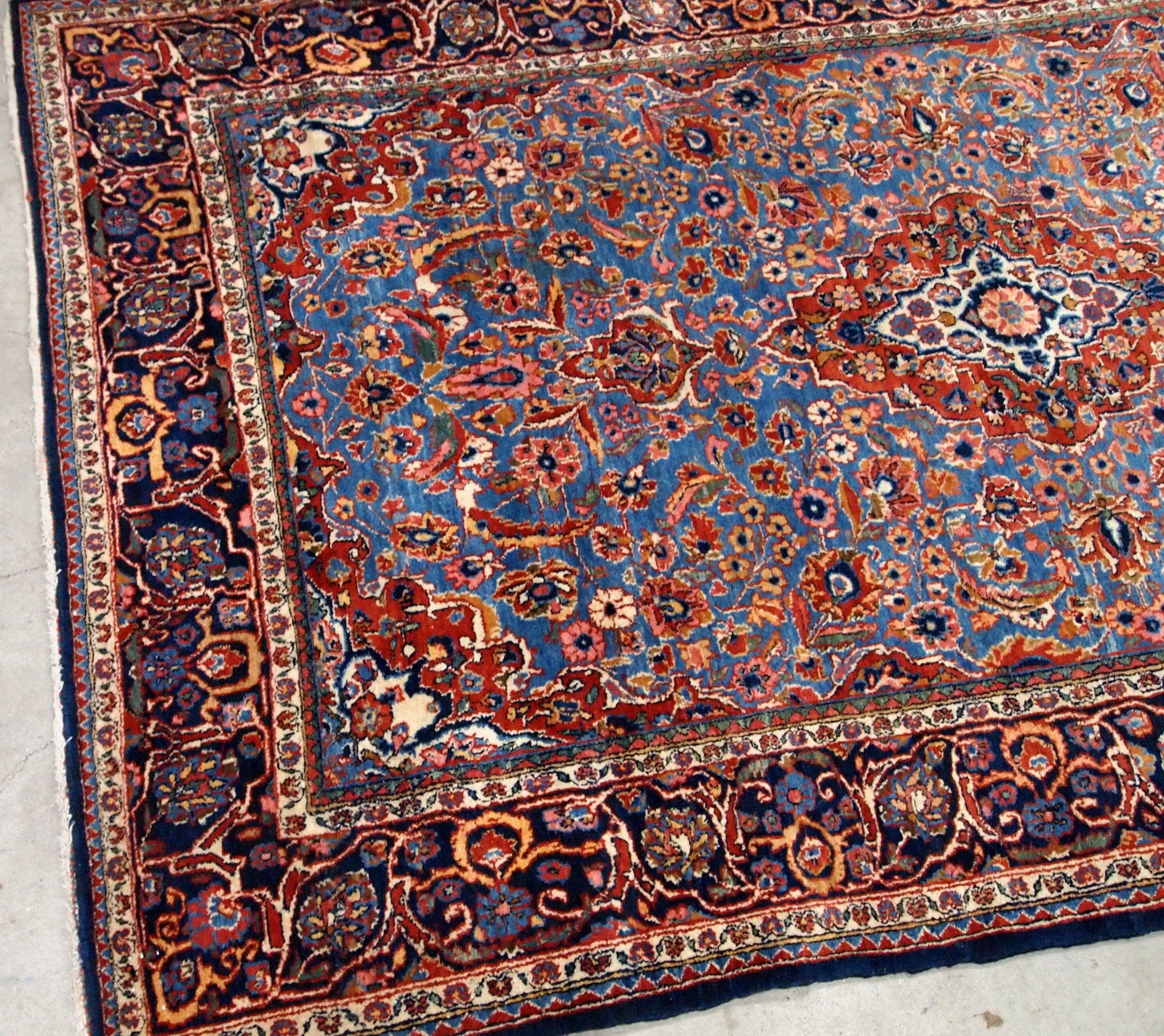 Antique Persian hand made Kashan rug in sky blue color. The rug is in original good condition from the beginning of 20th century.