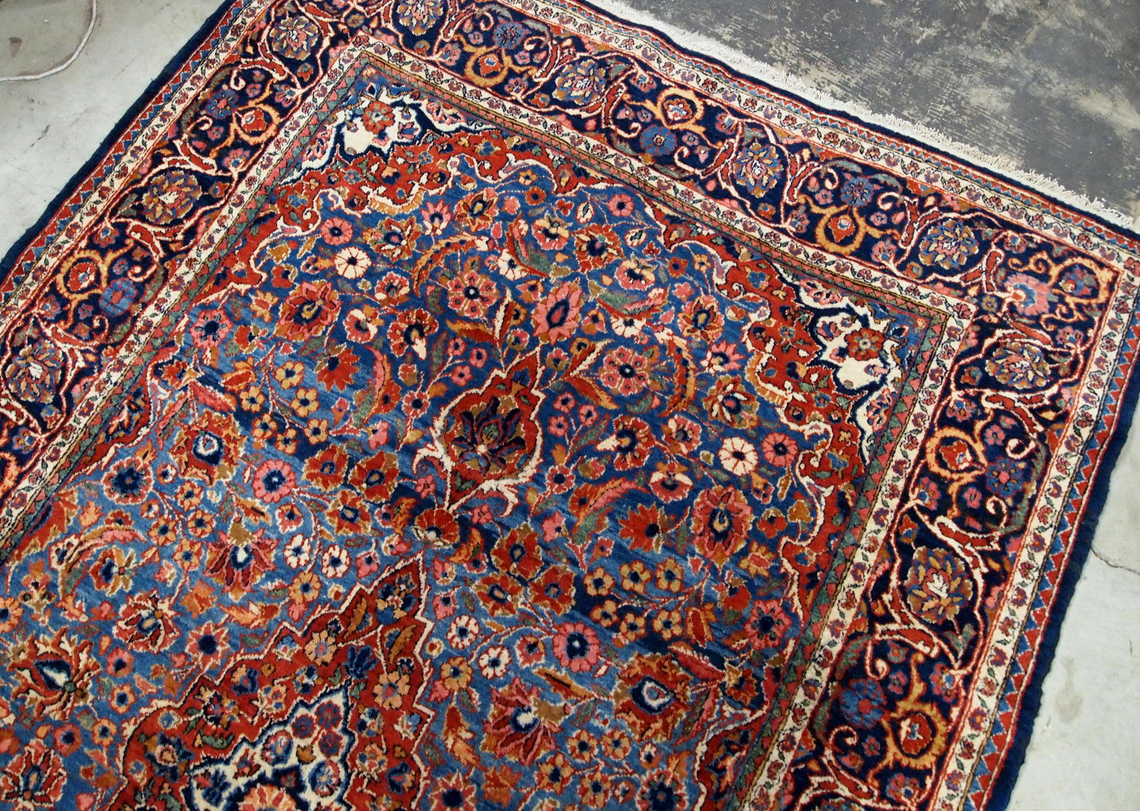 Antique Persian hand made Kashan rug in sky blue color. The rug is in original good condition from the beginning of 20th century.