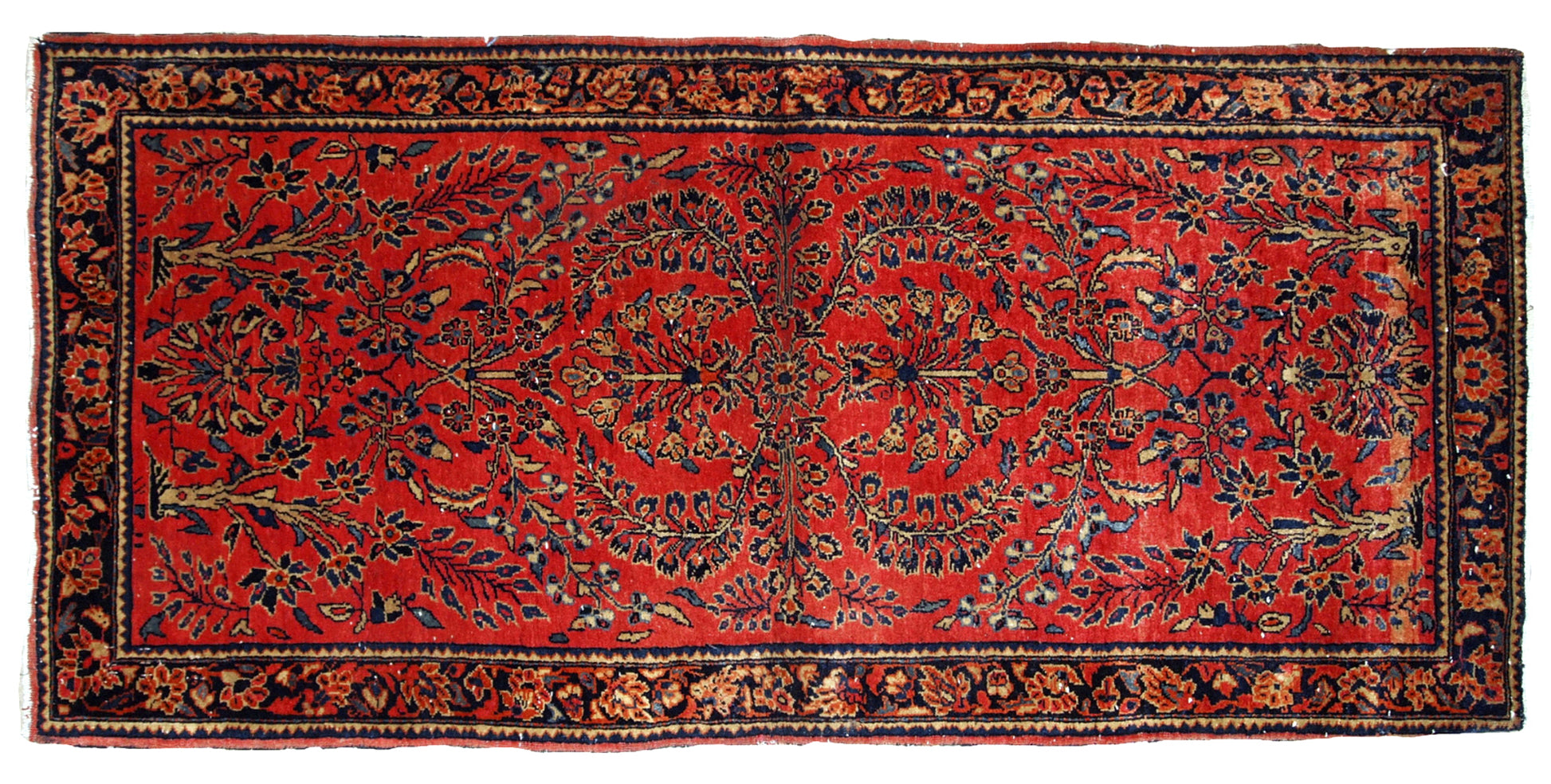 Antique hand made Persian Sarouk runner in red wool and floral design. The rug made in 1900s and it is in original good condition.
