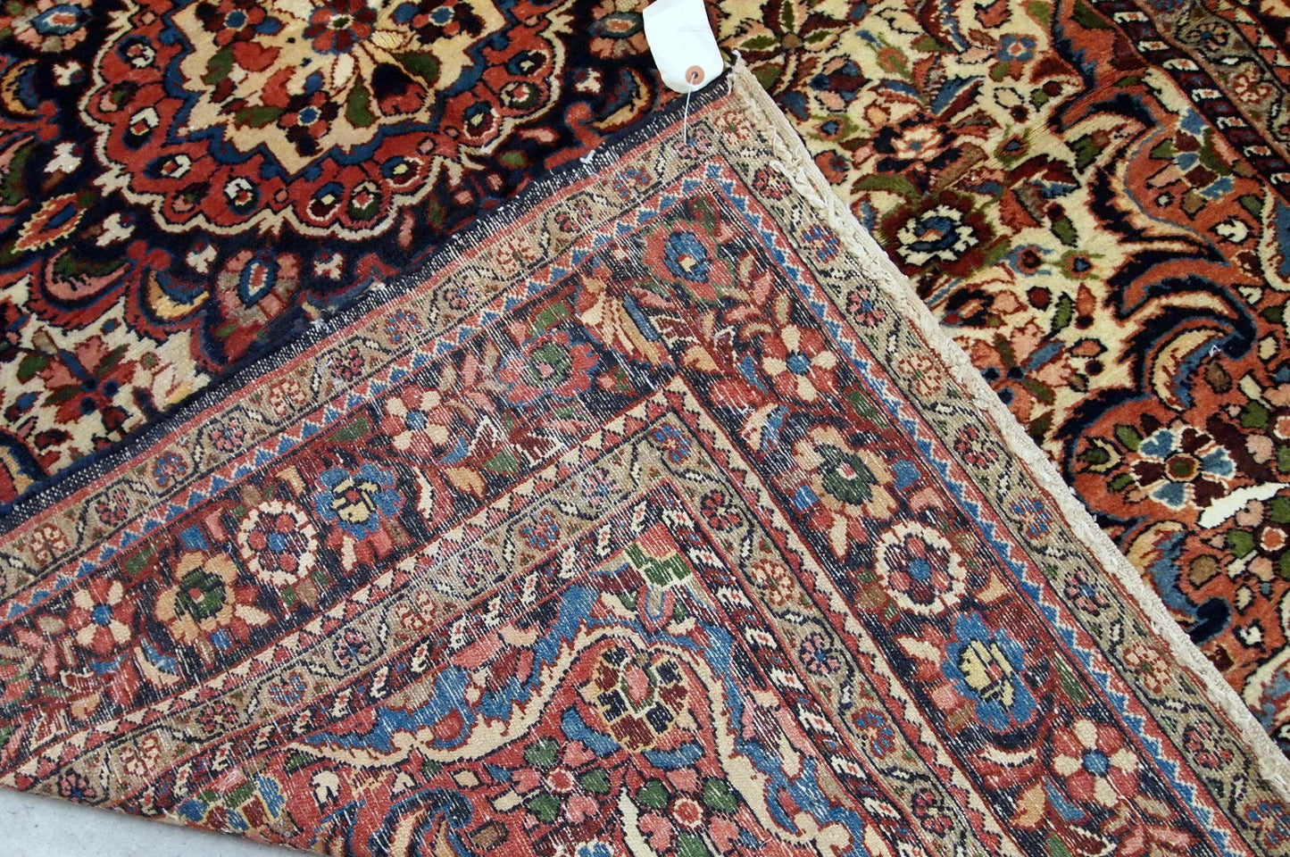Handmade antique Persian Sarouk rug 1900s