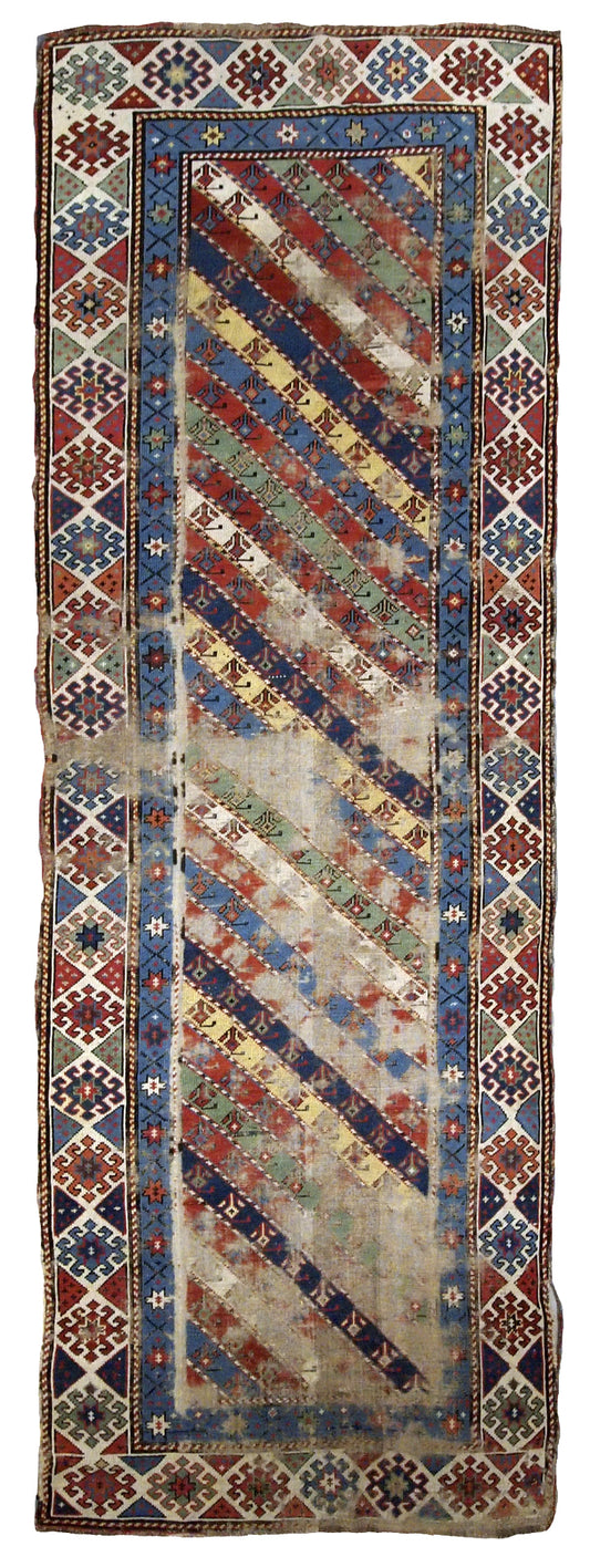 Handmade antique distressed Caucasian Gendje rug 1870s