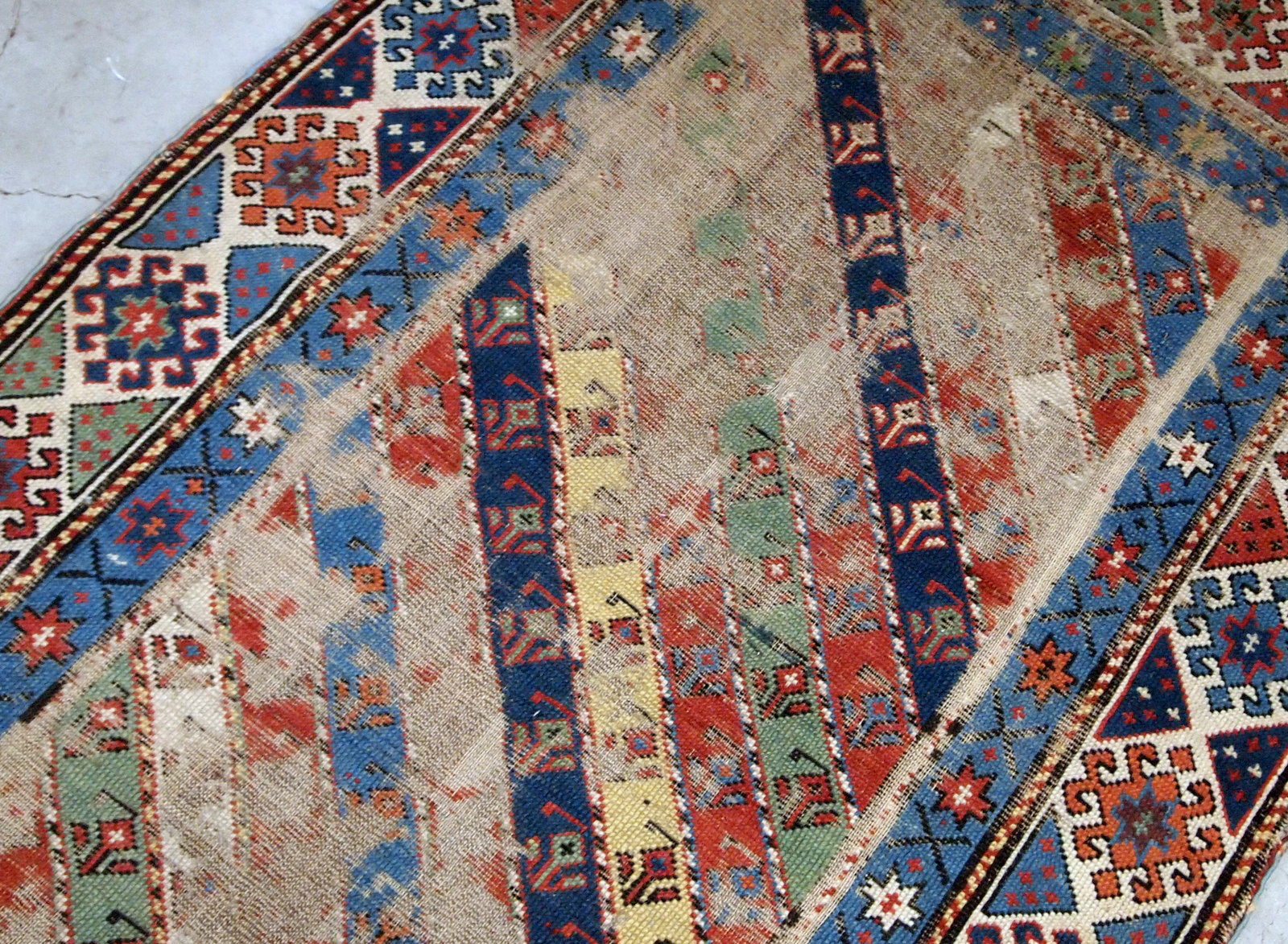 Handmade antique distressed Caucasian Gendje rug 1870s