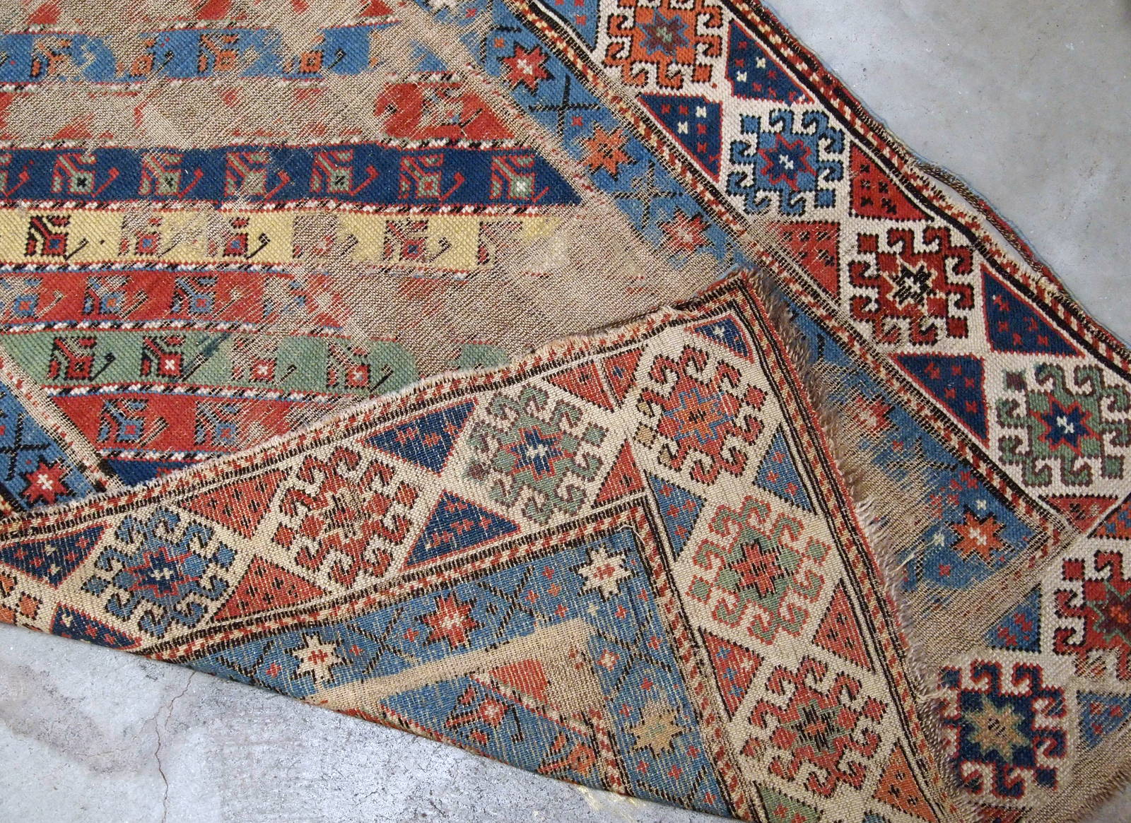 Handmade antique distressed Caucasian Gendje rug 1870s