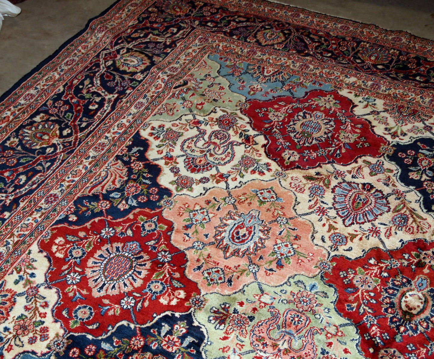 Antique Persian Kashan rug in colourful shades. The rug is in good condition, made in the beginning of 20th century.