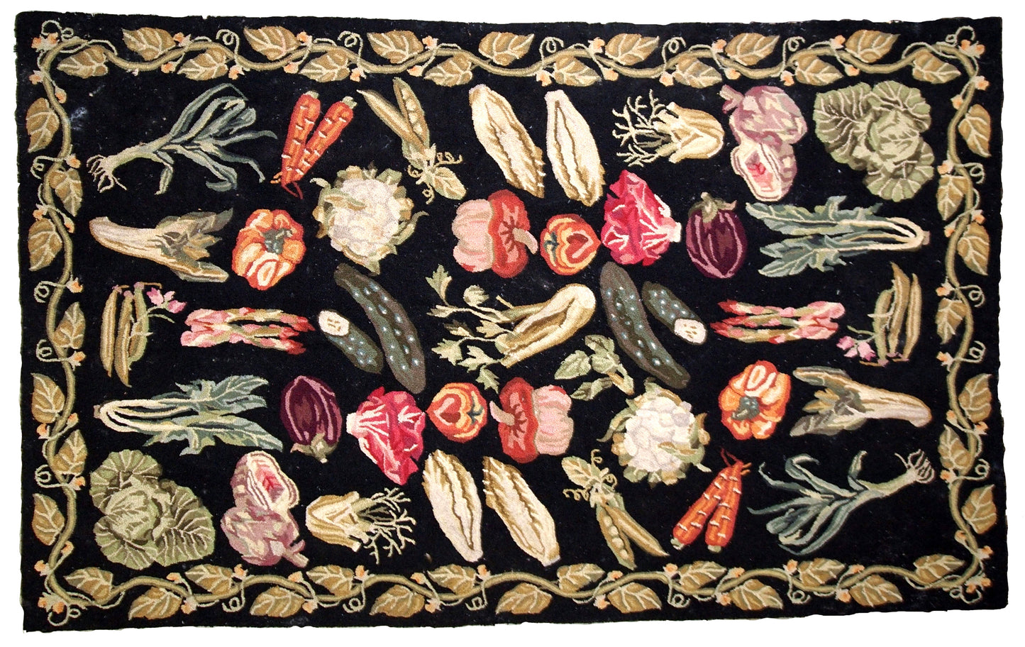 Handmade antique American Hooked rug in black color with variety of vegetables. This rug has been made in the beginning of 20th century, it remains in original good condition.