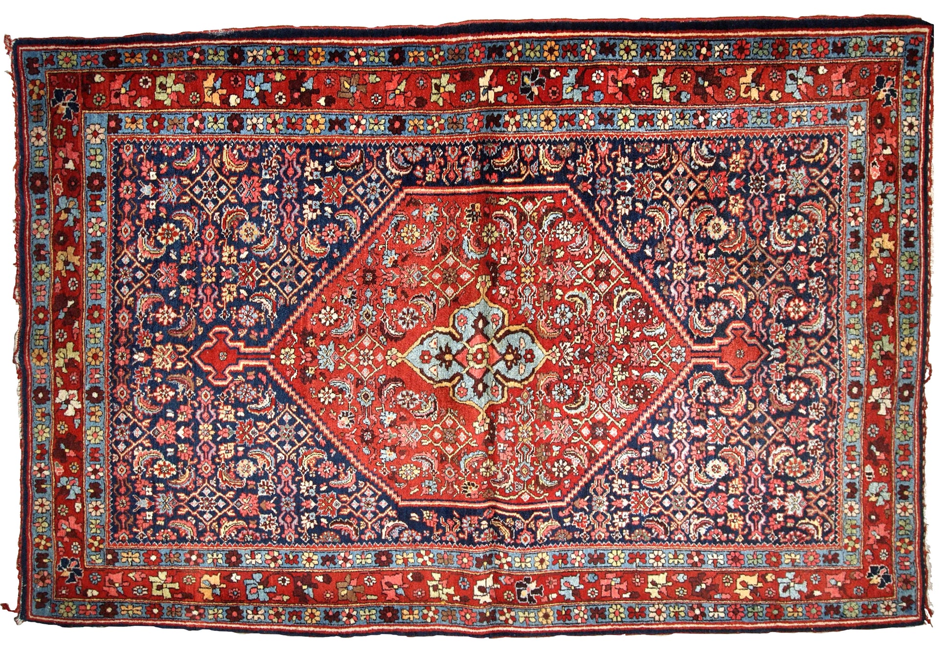 Handmade antique Bidjar rug from the beginning of 20th century. The rug is in original good condition made in red and blue wool.