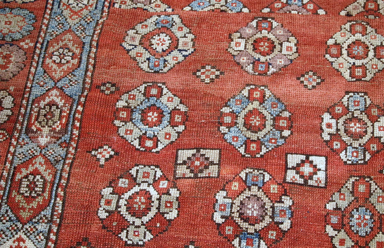 Handmade antique Turkish Melas rug in red, sky blue and beige shades. The rug is from the end of 19th century in original good condition.