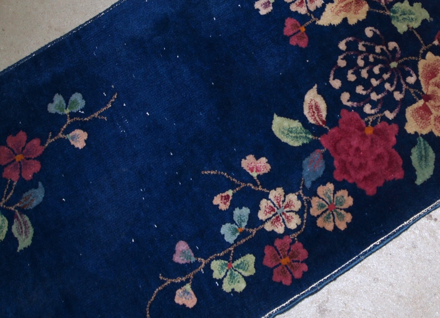 Hand made antique Art Deco Chinese rug in deep blue shade. The rug is in original condition, has some low pile.