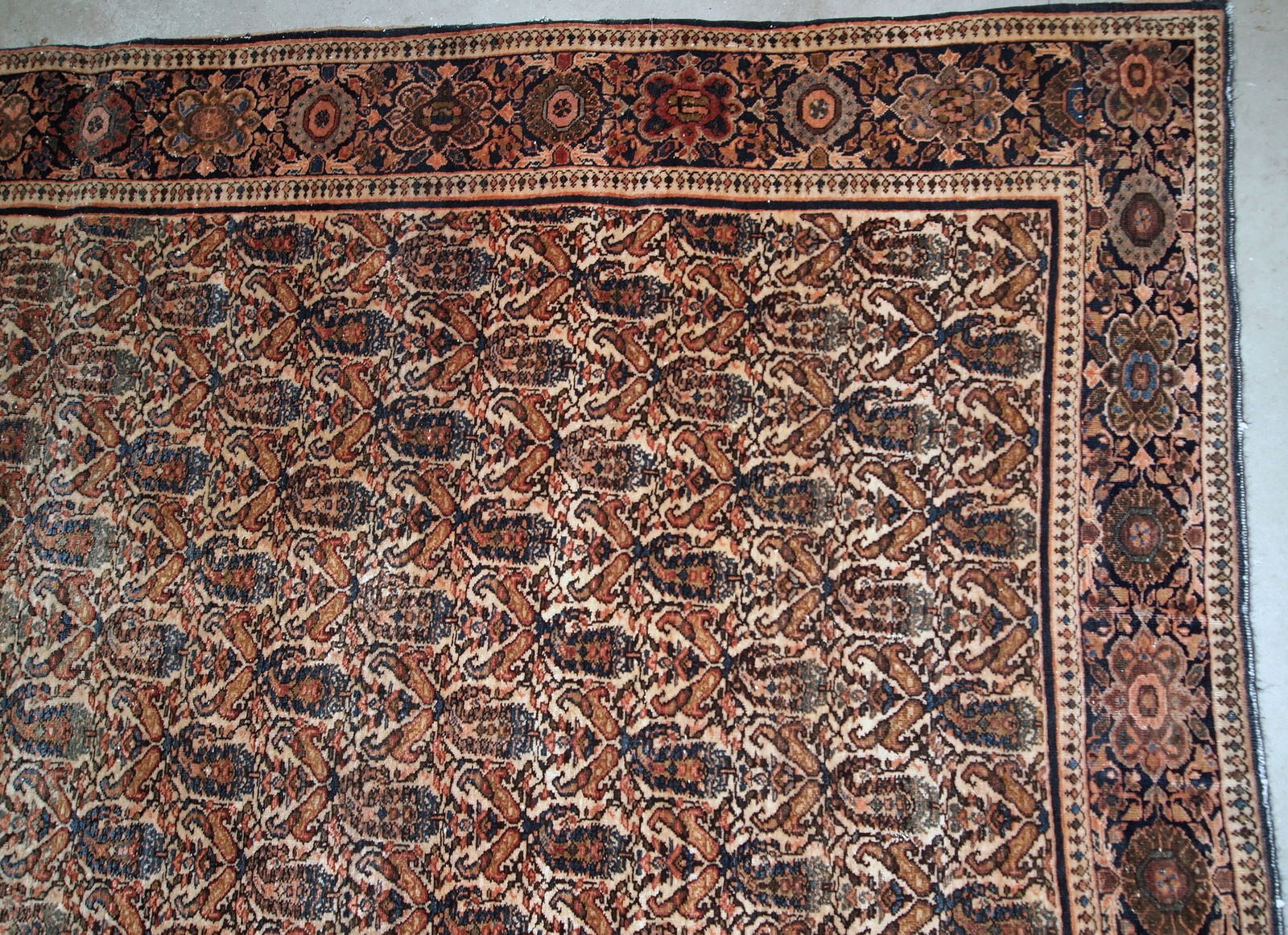 Handmade antique Farahan rug in original good condition. The rug has been made in the beginning of 20th century with all-over design.