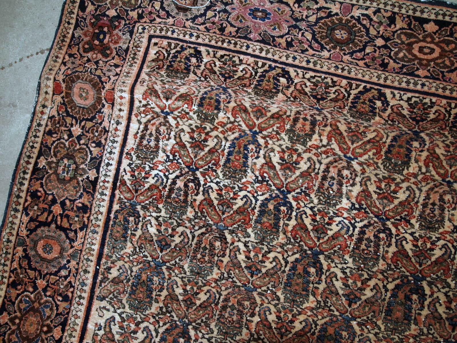 Handmade antique Farahan rug in original good condition. The rug has been made in the beginning of 20th century with all-over design.