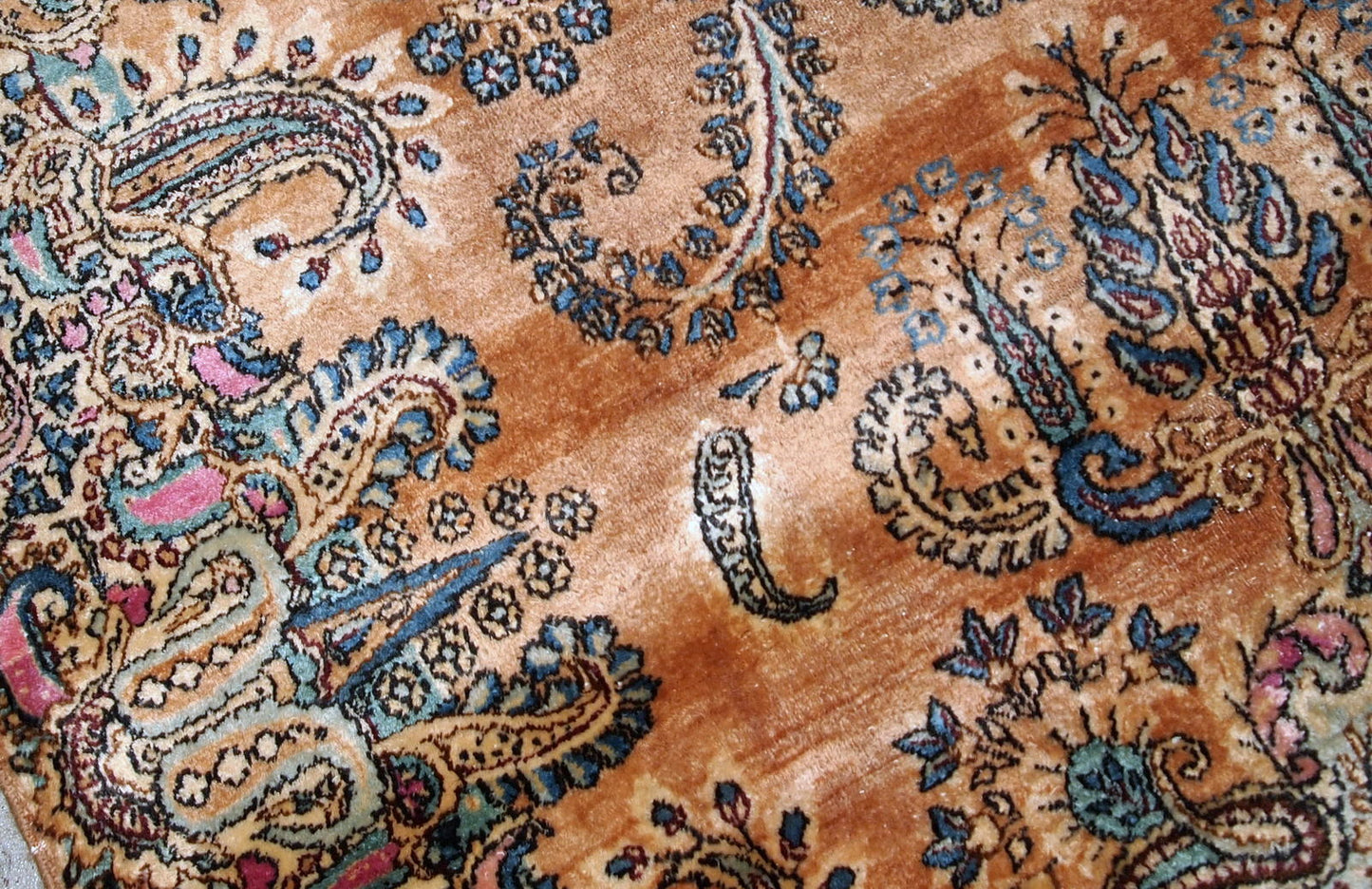 Antique hand-woven Kerman rug in original good condition. The rug is from the beginning of 20th century.