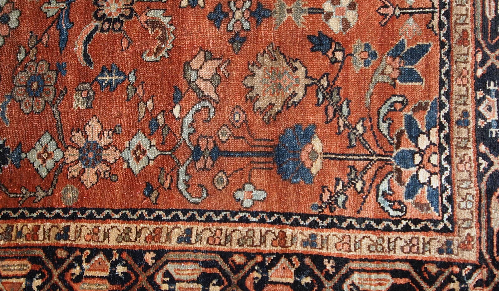 Hand made antique Hamadan rug from the beginning of 20th century. The rug is in red wool and in original good condition.