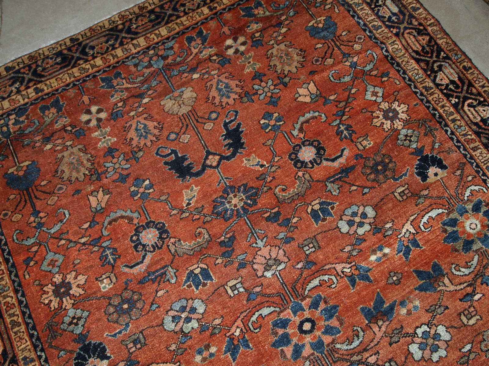 Hand made antique Hamadan rug from the beginning of 20th century. The rug is in red wool and in original good condition.