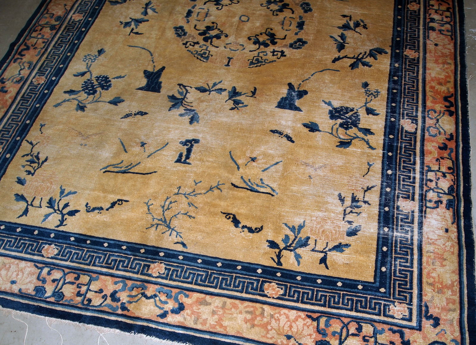 Handmade antique collectible Chinese Ningxia rug in yellow shade. The rug is in original condition, has age wears.