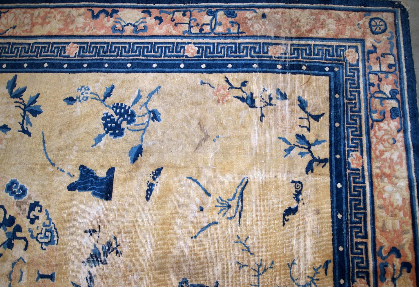 Handmade antique collectible Chinese Ningxia rug in yellow shade. The rug is in original condition, has age wears.