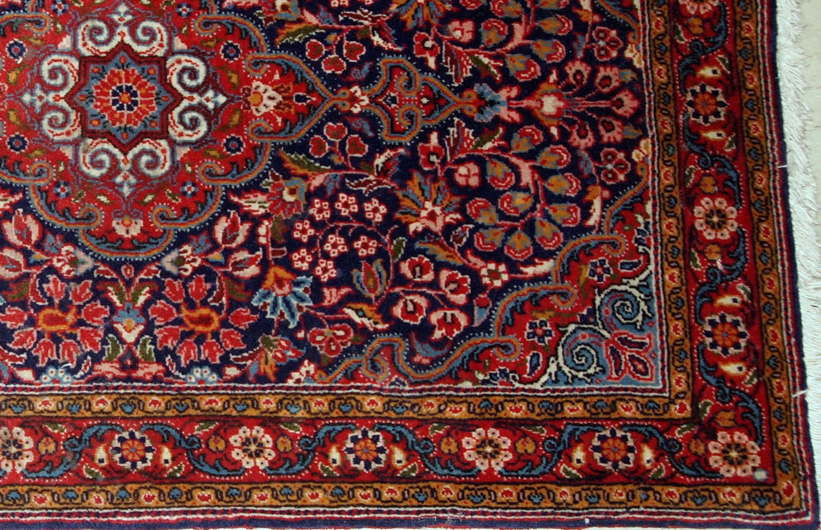 Handmade antique Persian Kazvin rug in original good condition. The rug is from the beginning of 20th century.