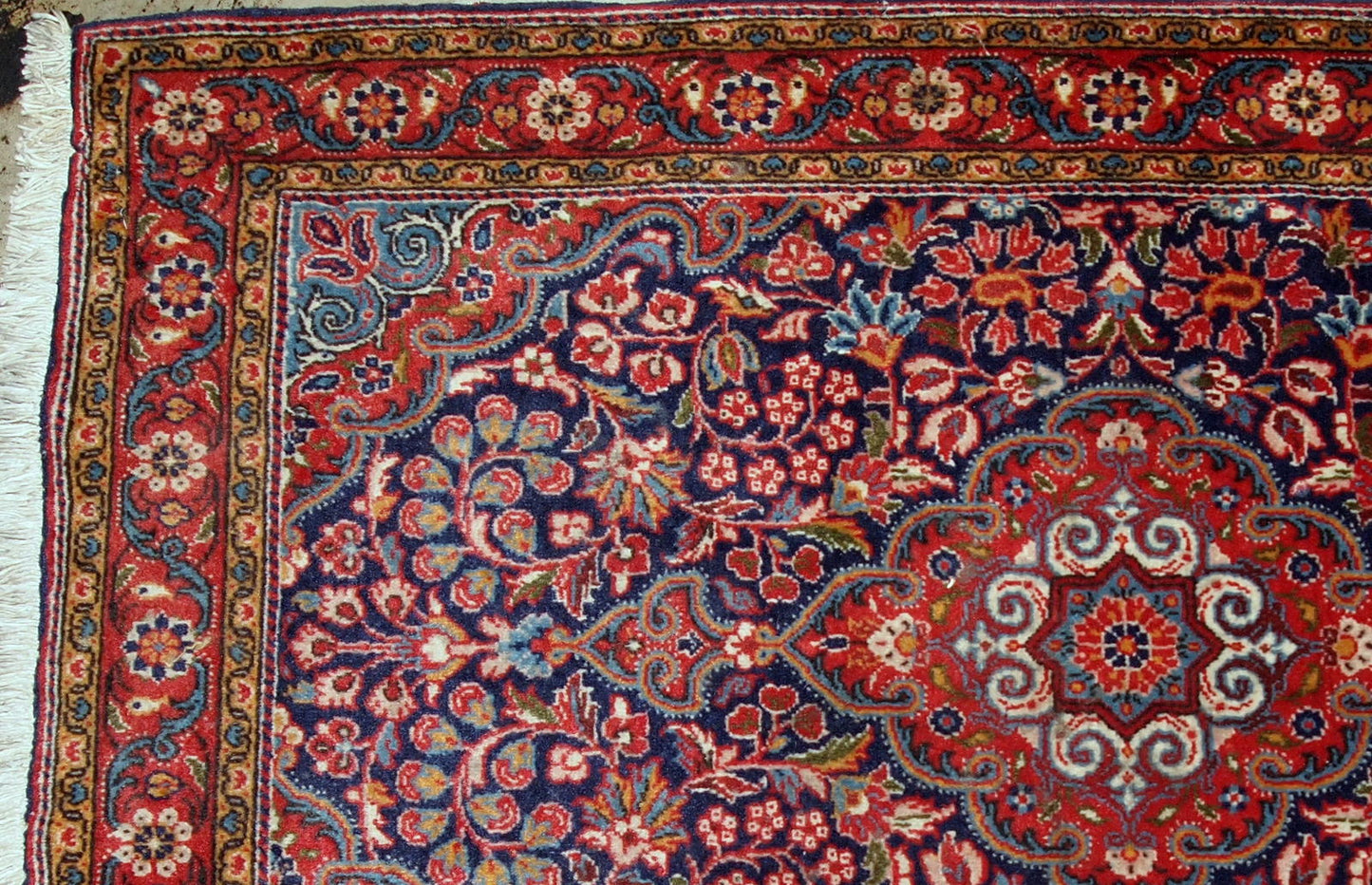Handmade antique Persian Kazvin rug in original good condition. The rug is from the beginning of 20th century.