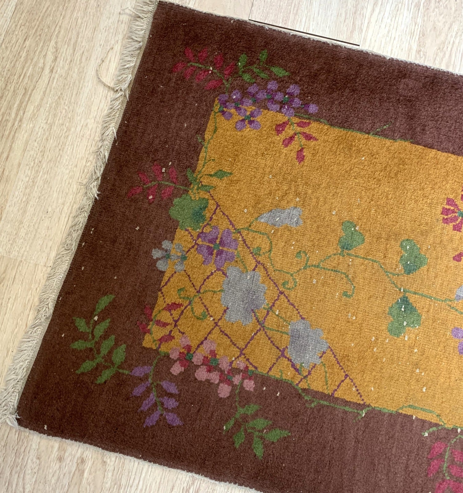 Handmade antique Art Deco Chinese rug in original condition, it has some low pile. The rug is from the beginning of 20th century. 