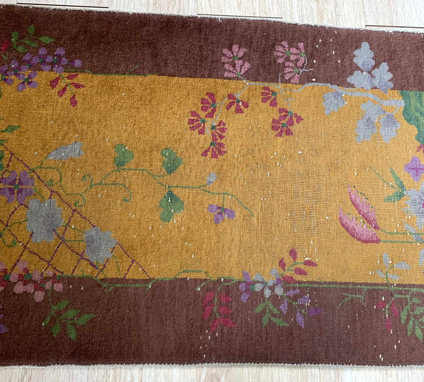 Handmade antique Art Deco Chinese rug in original condition, it has some low pile. The rug is from the beginning of 20th century. 