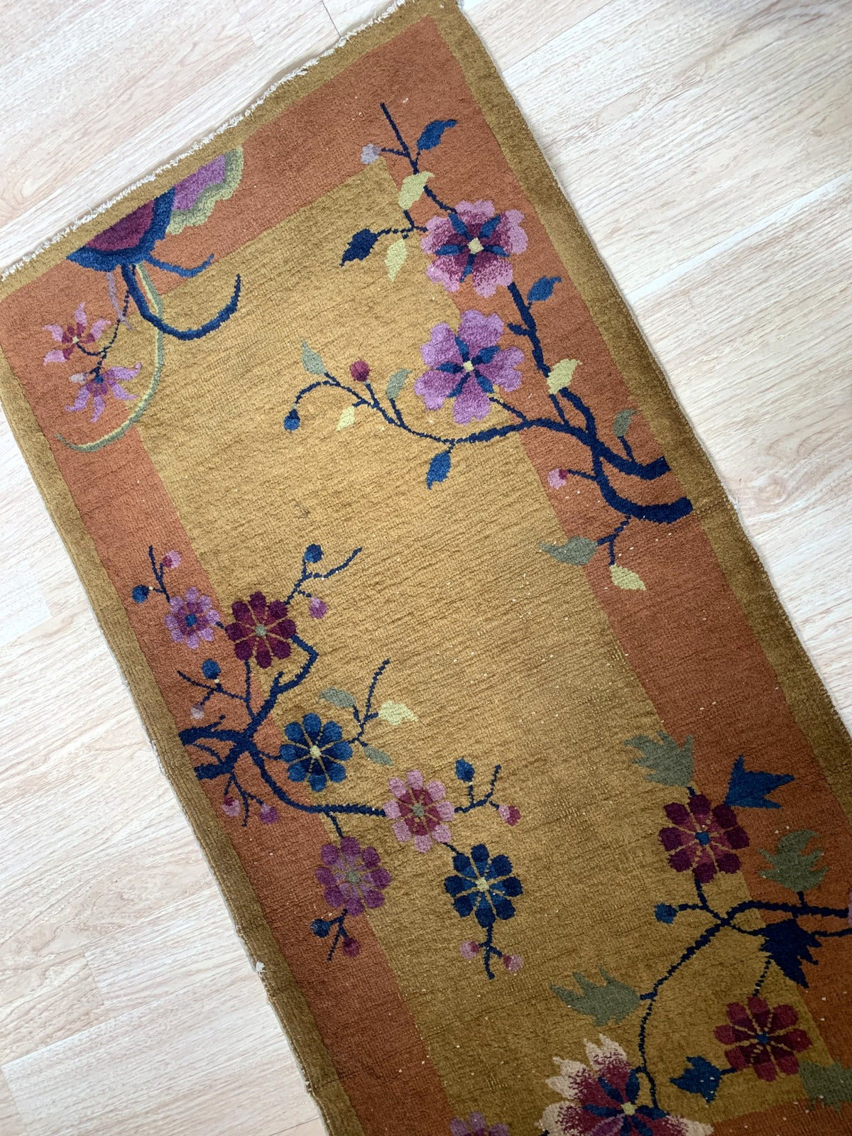 Handmade antique Art Deco Chinese rug in original good condition, it has some low pile. The rug is from the beginning of 20th century. 