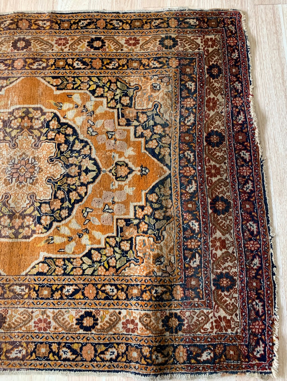 Handmade antique Middle Eastern rug in natural dyes. The rug is from the end of 19th century in original condition, it has some signs of age.