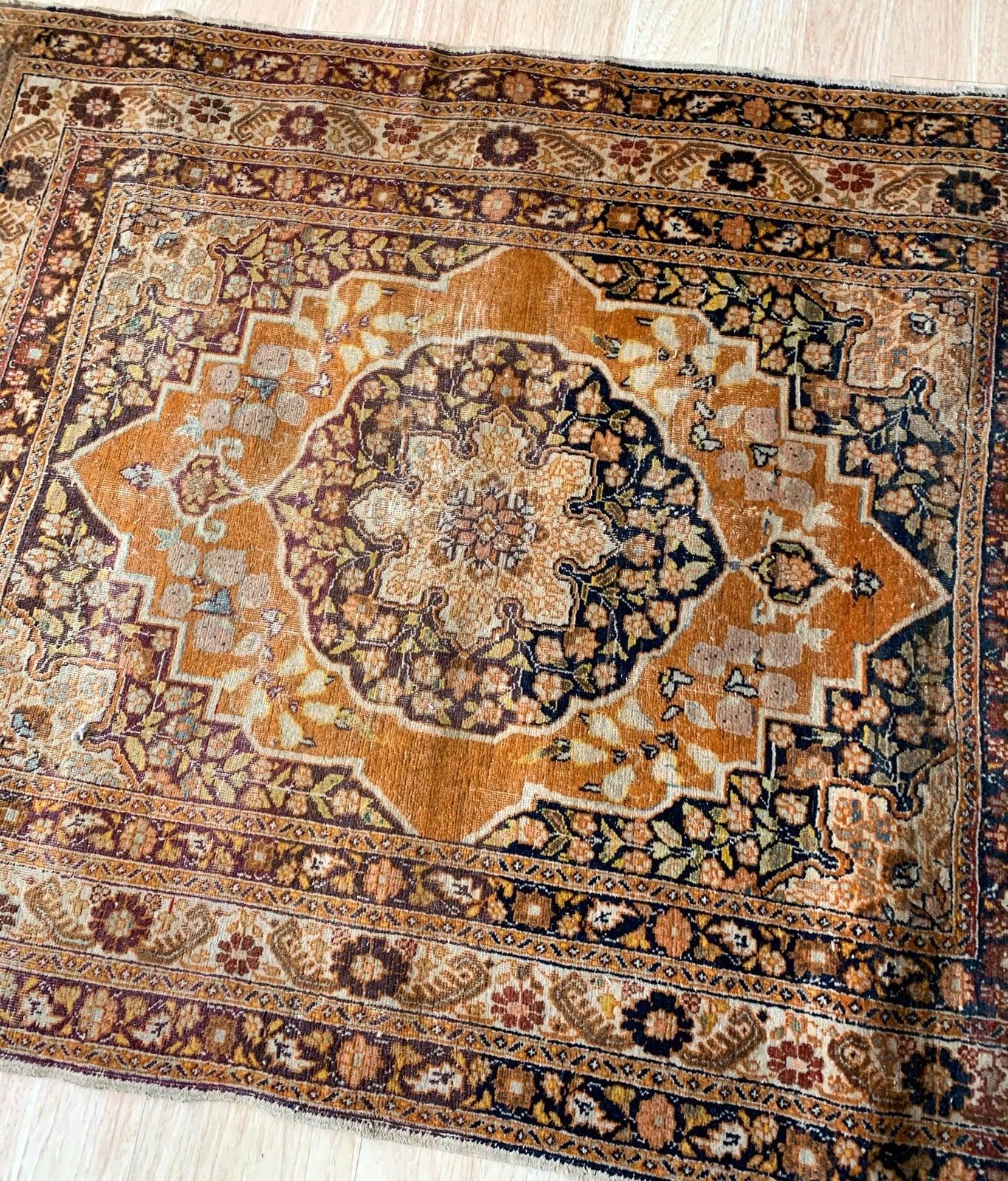 Handmade antique Middle Eastern rug in natural dyes. The rug is from the end of 19th century in original condition, it has some signs of age.