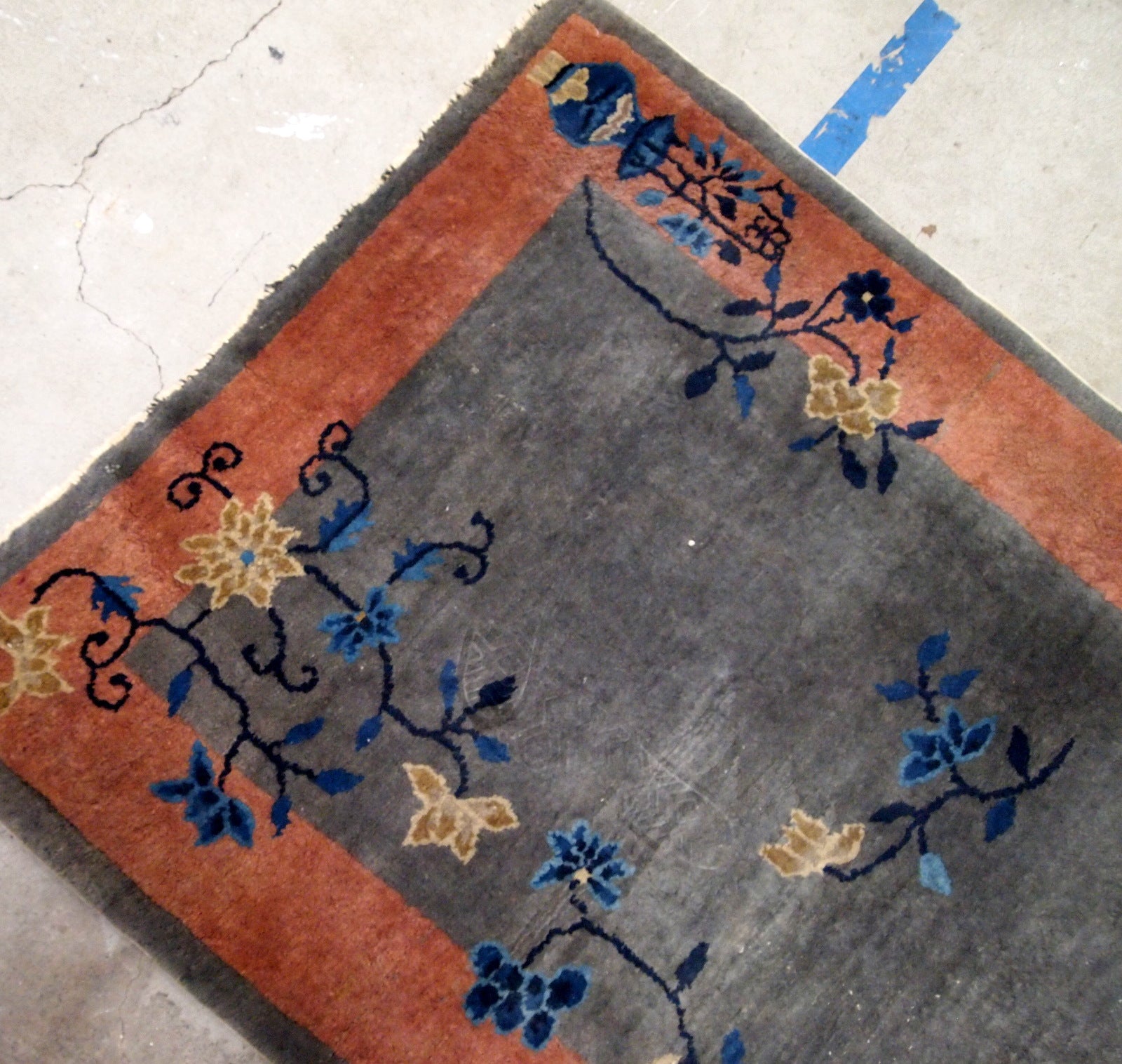 Handmade antique Art Deco Chinese rug in red and grey shades. The rug is from the beginning of 20th century in original good condition.