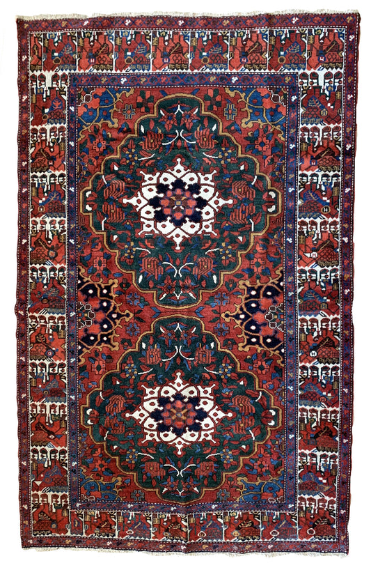 Handmade antique Persian Bakhtiari rug 1920s