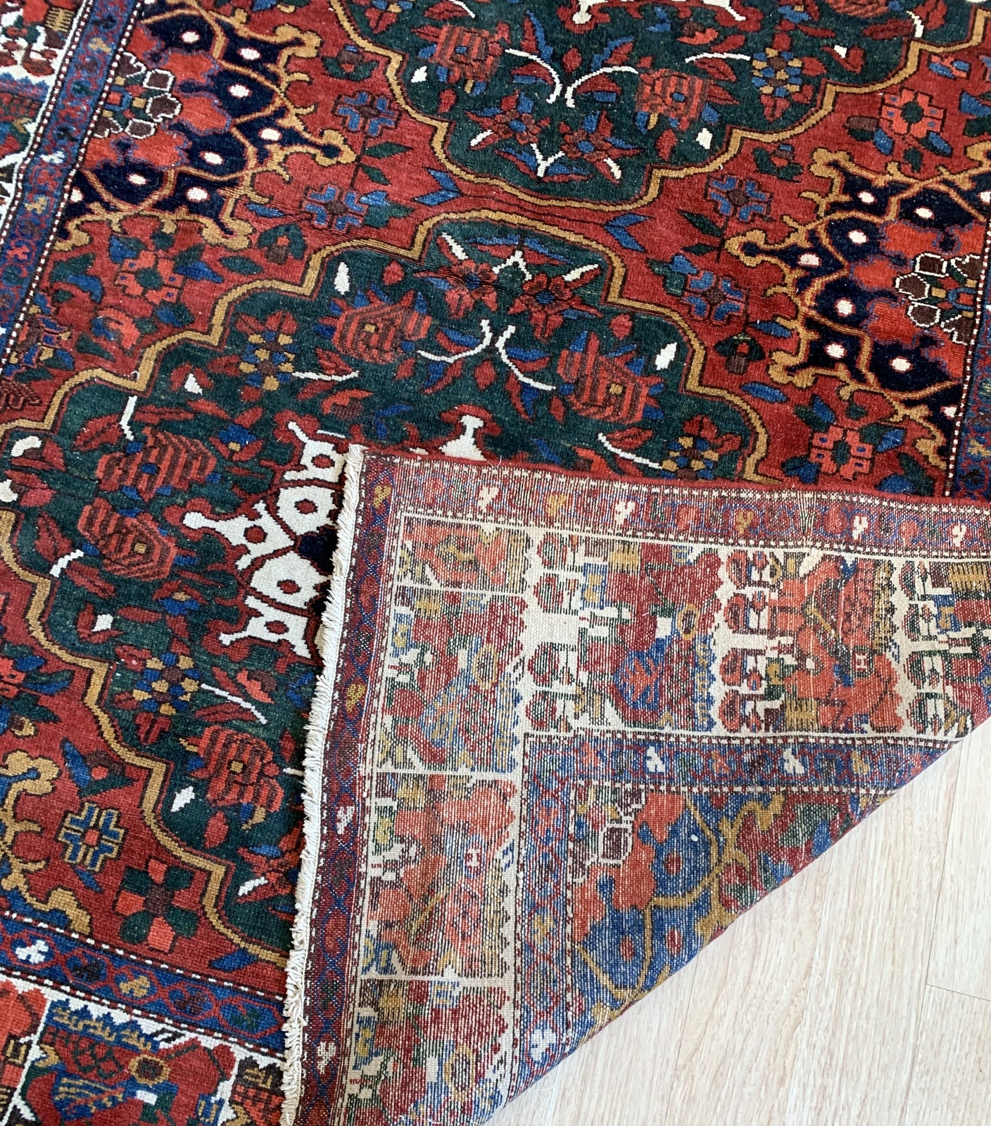 Handmade antique Persian Bakhtiari rug 1920s