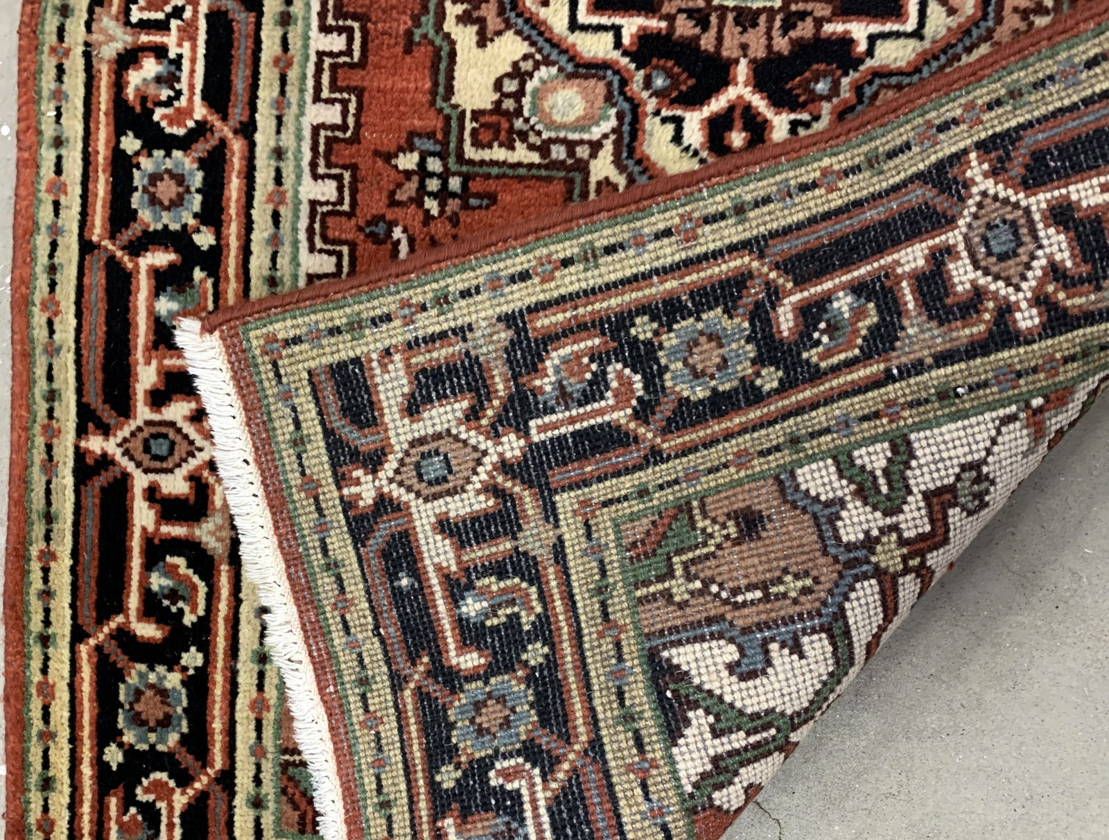 Handmade vintage Persian Heriz rug 1970s