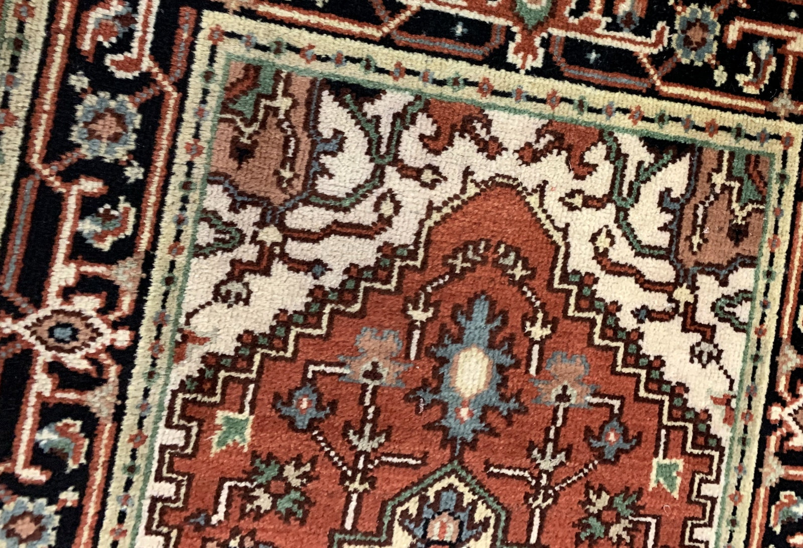 Handmade vintage Middle Eastern rug in traditional design and natural dyes. The rug is from the end of 20th century in original good condition.