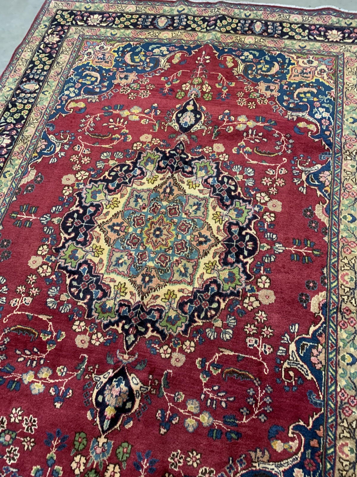 Handmade vintage Middle Eastern rug in traditional design. The rug is from the middle of 20th century in original good condition.