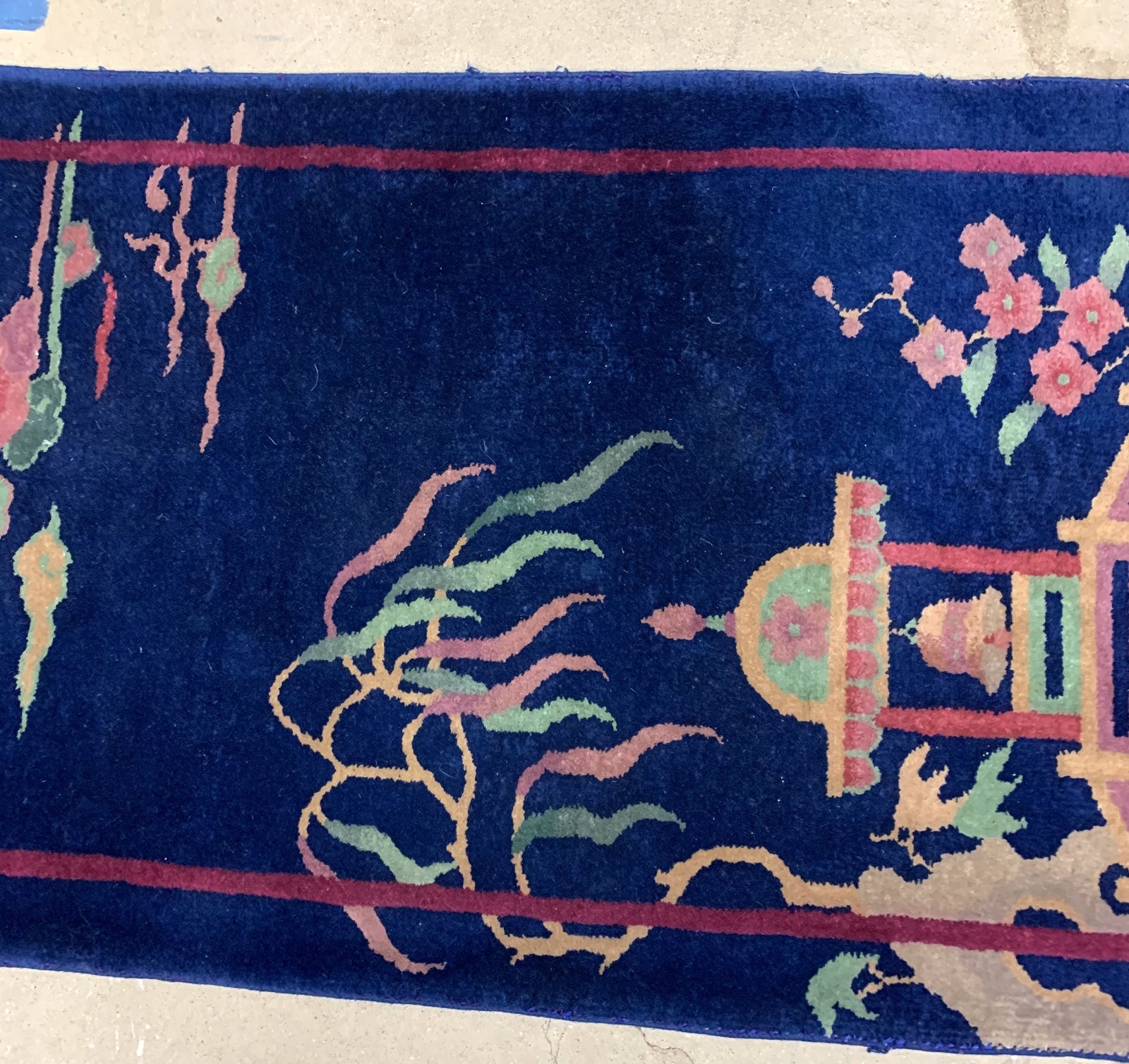 Handmade antique Art Deco Chinese rug in deep blue shade. The rug is from the beginning of 20th century in original condition. 