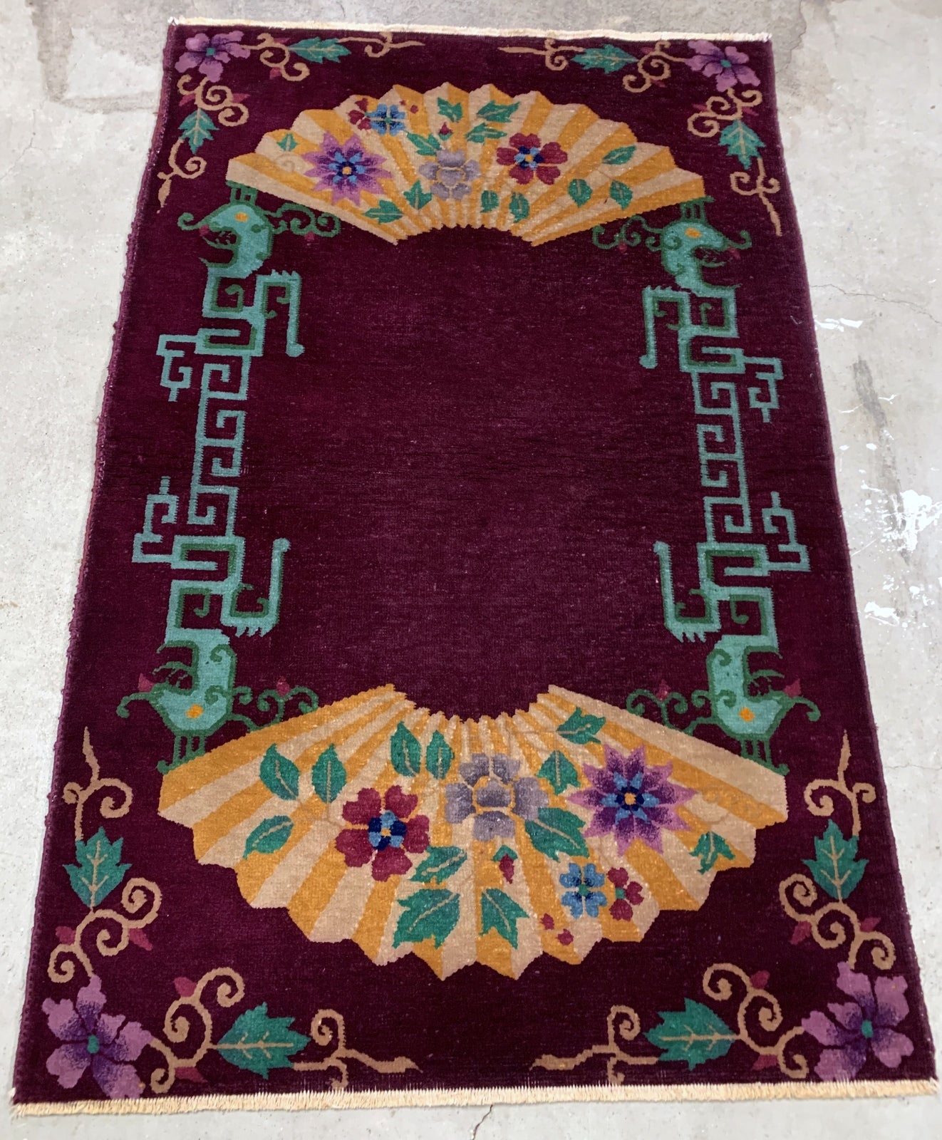Handmade antique Art Deco Chinese rug in purple shade and very unusual design. The rug is from the beginning of 20th century in original good condition. 