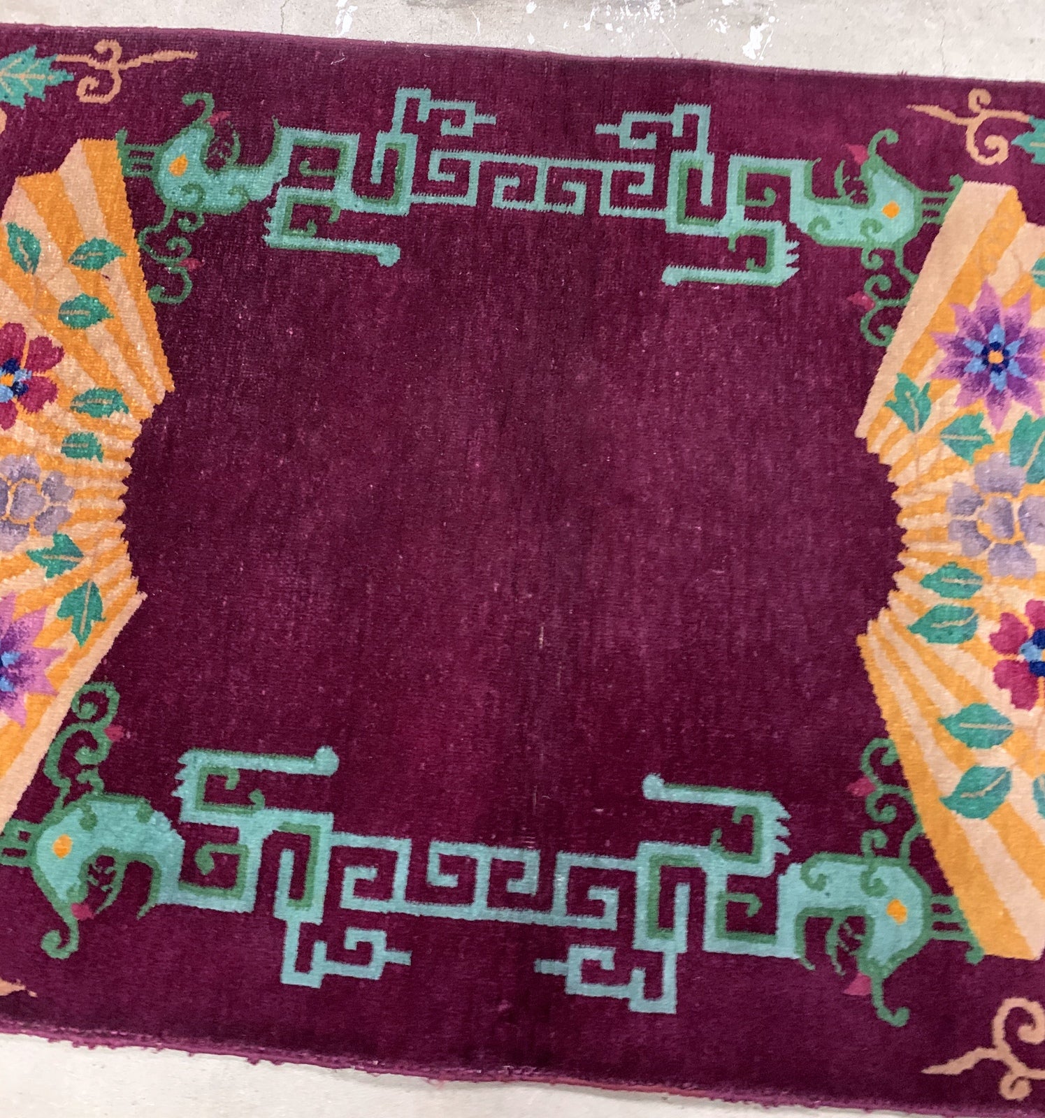 Handmade antique Art Deco Chinese rug in purple shade and very unusual design. The rug is from the beginning of 20th century in original good condition. 