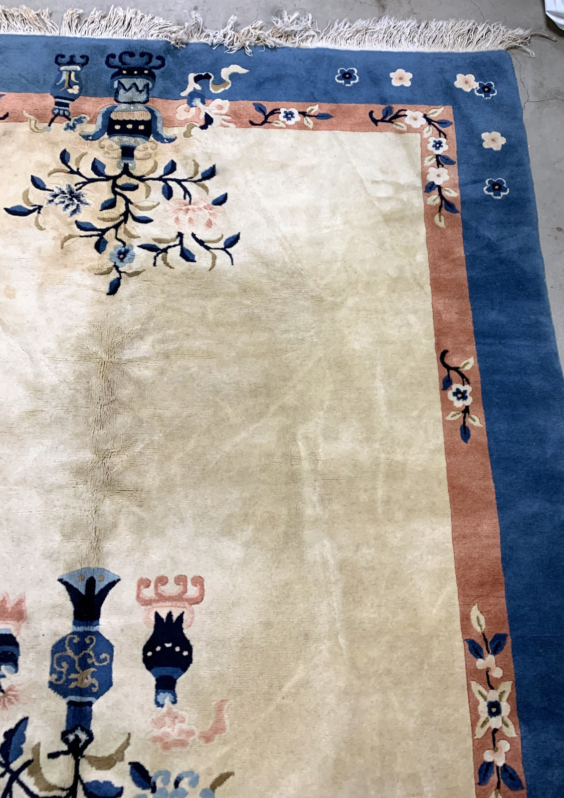 Handmade vintage Art Deco Chinese rug in beige and blue shades. The rug is from the beginning of 20th century in original good condition. 