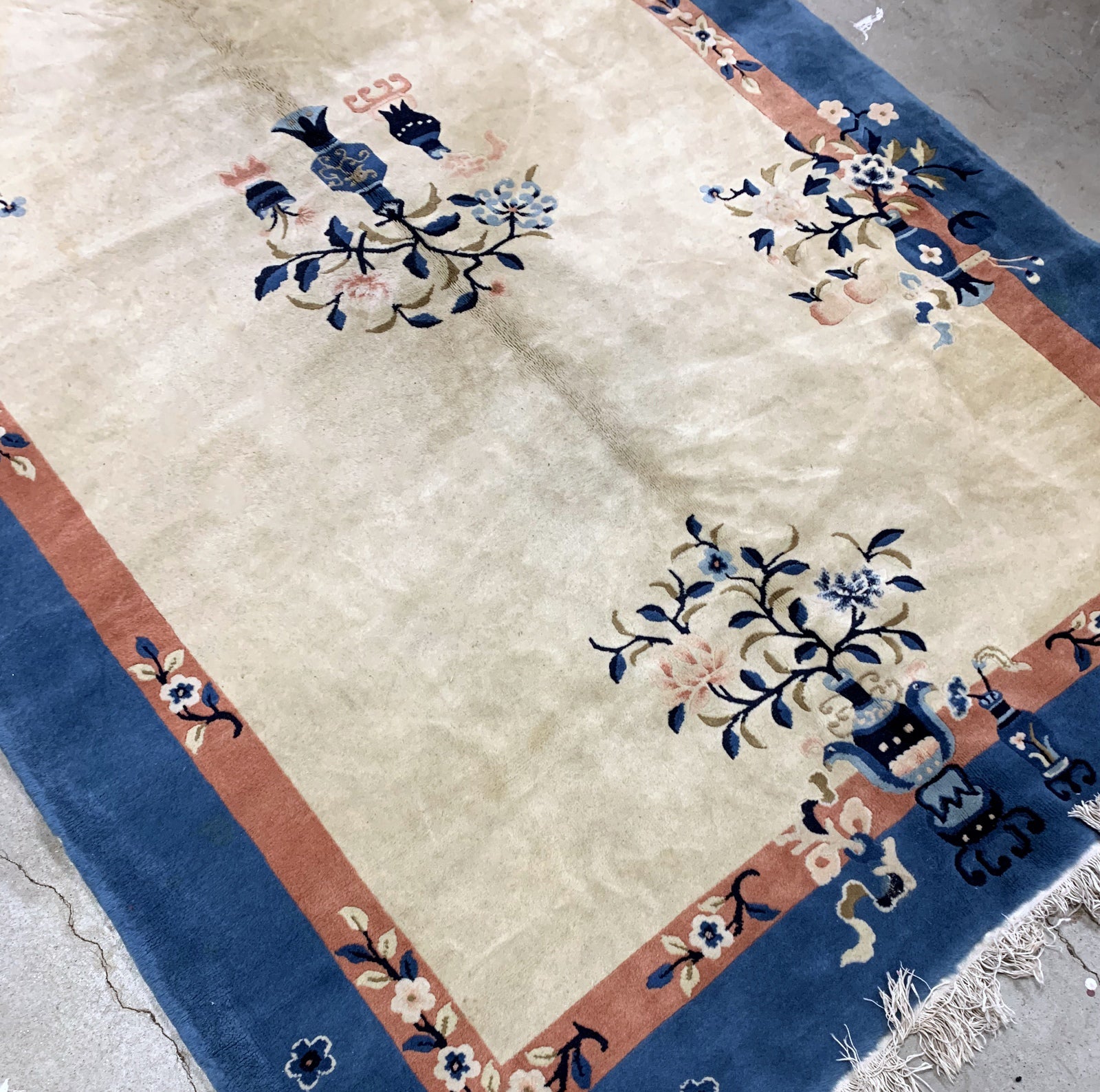 Handmade vintage Art Deco Chinese rug in beige and blue shades. The rug is from the beginning of 20th century in original good condition. 