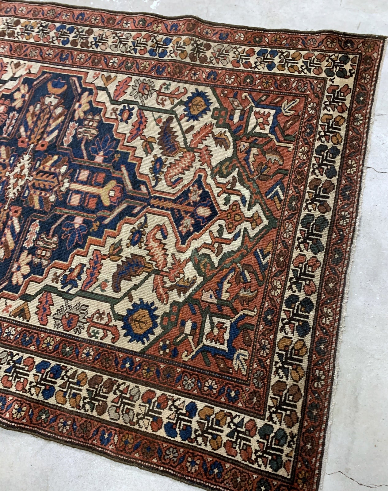 Handmade antique Middle Eastern Malayer rug in traditional design. The rug is from the beginning of 20th century in original good condition.