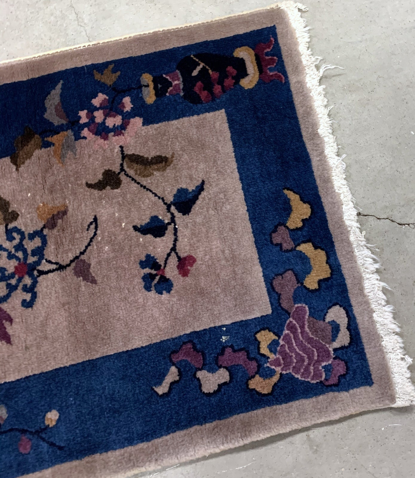 Handmade antique Art Deco Chinese rug in deep blue and light burgundy shades. The rug is from the beginning of 20th century in original mint condition. 
