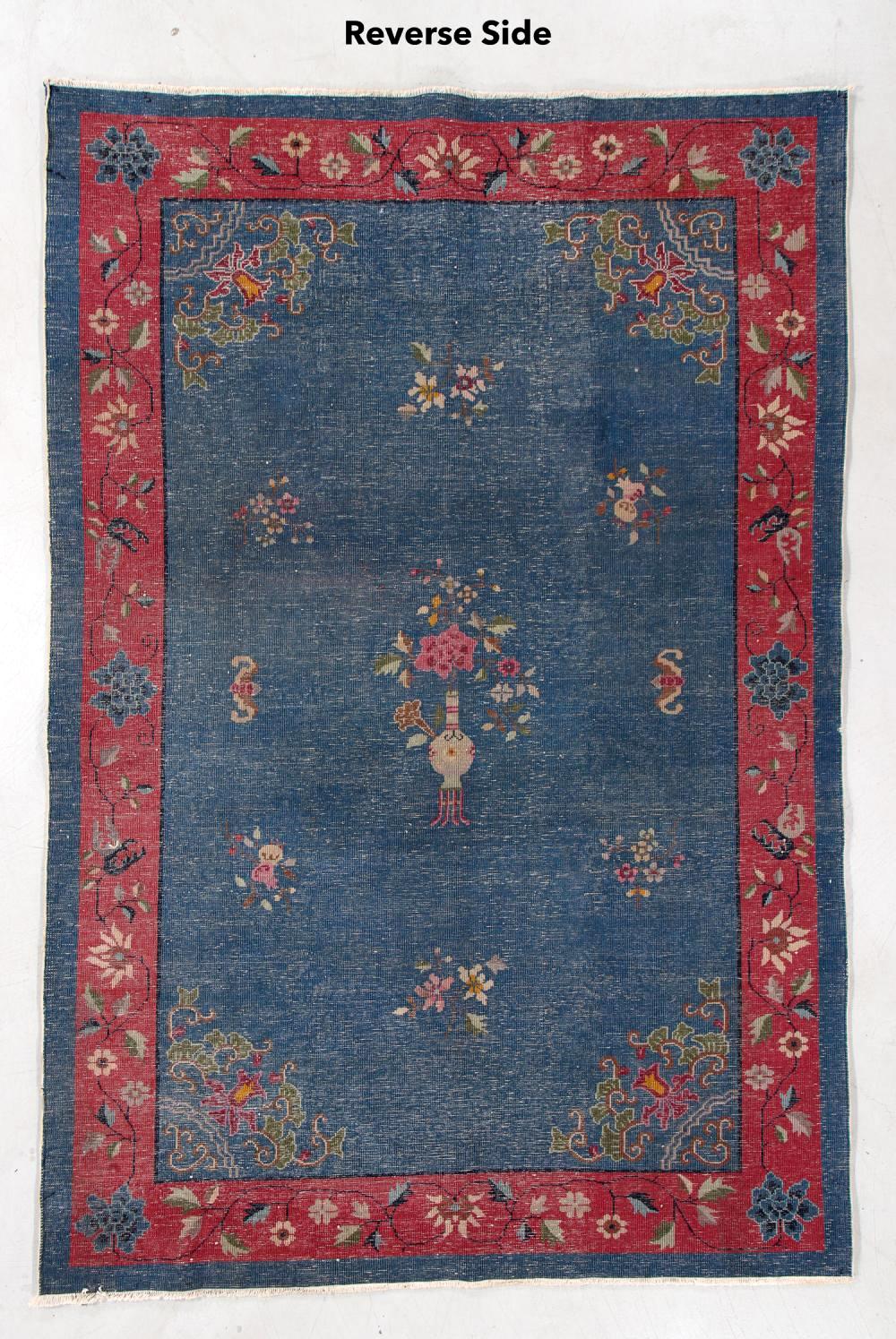 Handmade antique Art Deco Chinese rug in blue and red shades. The rug is from the beginning of 20th century in original good condition. 