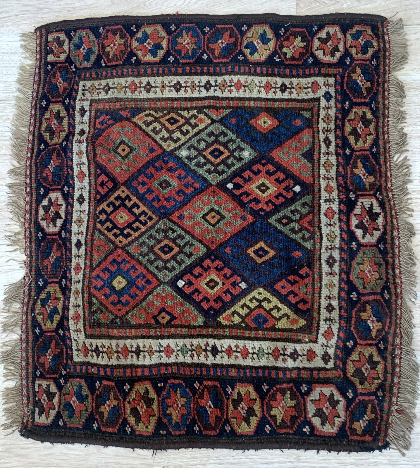 Handmade antique Persian Kurdish jaf bag face in original good condition. The rug has been made in the end of 19th century in Persia. All dyes on the bag face are natural. This rug is collectible piece.