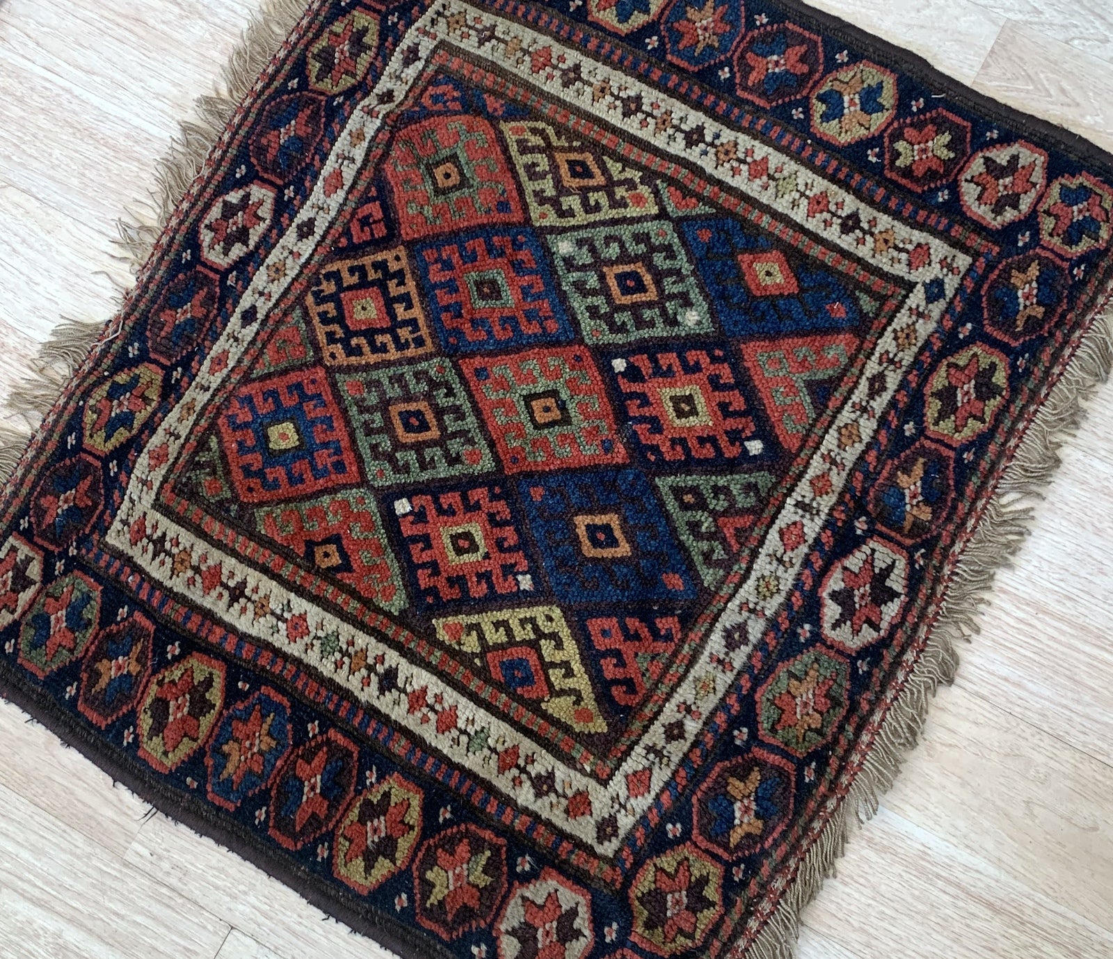 Handmade antique Persian Kurdish jaf bag face in original good condition. The rug has been made in the end of 19th century in Persia. All dyes on the bag face are natural. This rug is collectible piece.