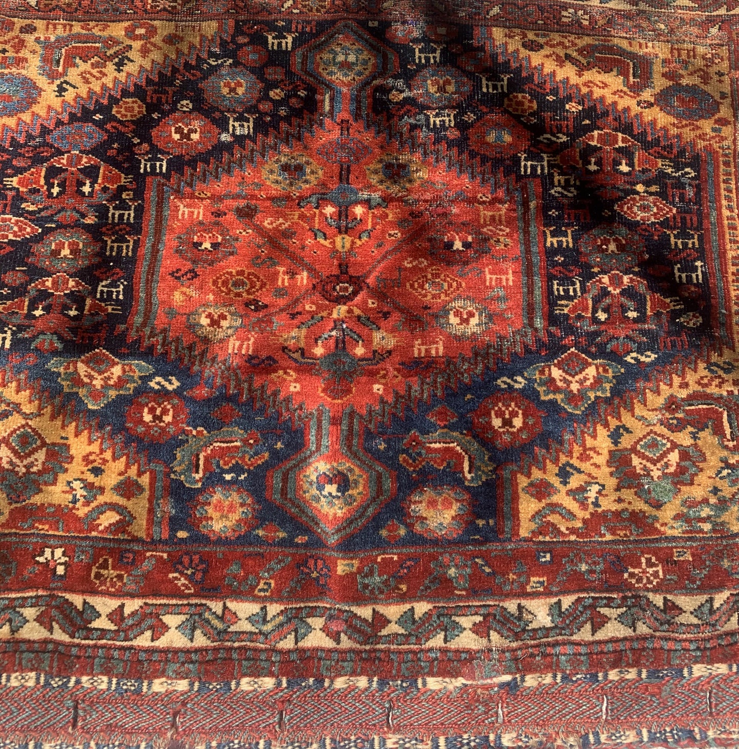 Handmade antique Persian collectible Gashkai bagface. The rug is from the end of 19th century in original condition, it has some signs of age.